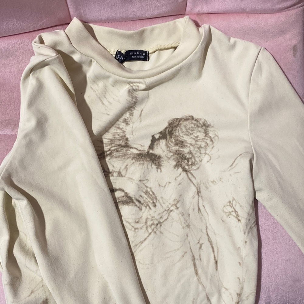 SHEIN ANGEL LONG SLEEVE CROP TOP